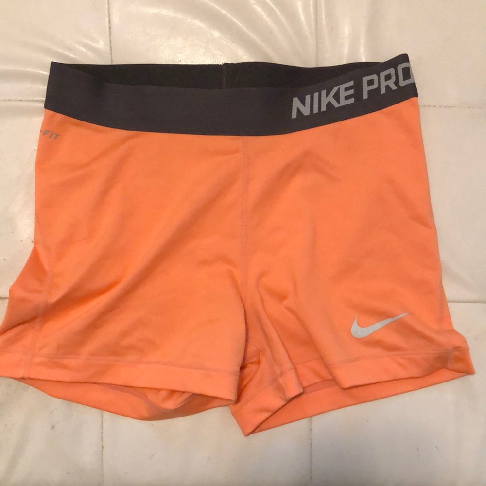 Women’s bright orange Nike Pro Dri Fit short